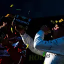 Sebastian Vettel (GER) Ferrari and Valtteri Bottas (FIN) Mercedes AMG F1 celebrate on the podium with the champagne at Formula One World Championship, Australian Grand Prix, Race, Melbourne, Australia, Sunday 26 March 2017. © Sutton Motorsport Images