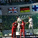Race winner Ferrari and Mercedes AMG F1 celebrate on the podium with the champagne at Formula One World Championship, Rd1, Australian Grand Prix, Race, Albert Park, Melbourne, Australia, Sunday 26 March 2017. © Sutton Motorsport Images