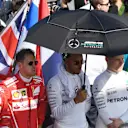 (L to R): Kimi Raikkonen (FIN), Sebastian Vettel (GER), Lewis Hamilton (GBR) and Valtteri Bottas (FIN) on the grid at F1 World Championship, Australian Grand Prix, Melbourne, Australia, 26 March 2017. ©Sutton Motorsport Images