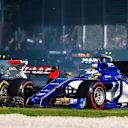 Marcus Ericsson (SWE) Sauber C36 and Kevin Magnussen (DEN) Haas VF-17 battle at Formula One World Championship, Rd1, Australian Grand Prix, Race, Albert Park, Melbourne, Australia, Sunday 26 March 2017. © Sutton Motorsport Images