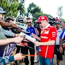 Kimi Raikkonen (FIN) Ferrari signs autographs for the fans at Formula One World Championship, Rd1, Australian Grand Prix, Preparations, Albert Park, Melbourne, Australia, Thursday 23 March 2017. © Sutton Motorsport Images