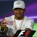 Lewis Hamilton (GBR) Mercedes AMG F1 in the Press Conference with his phone at Formula One World Championship, Rd1, Australian Grand Prix, Preparations, Albert Park, Melbourne, Australia, Thursday 23 March 2017. © Sutton Motorsport Images