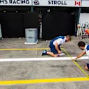 Williams mechanics mark out the pit box at Formula One World Championship, Rd1, Australian Grand Prix, Preparations, Albert Park, Melbourne, Australia, Wednesday 22 March 2017. © Sutton Motorsport Images