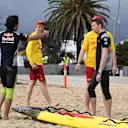 Daniil Kvyat (RUS) Scuderia Toro Rosso and Carlos Sainz jr (ESP) Scuderia Toro Rosso at a Casio Surf Life Savers event at F1 World Championship, Australian Grand Prix, Preparations, Melbourne, Australia, Wednesday 22 March 2017. © Sutton Motorsport Images