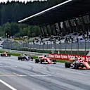 Stoffel Vandoorne (BEL) McLaren MCL32 dn Sebastian Vettel (GER) Ferrari SF70-H practice starts at Formula One World Championship, Rd9, Austrian Grand Prix, Practice, Spielberg, Austria, Friday 7 July 2017. © Sutton Images