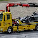 The car of Romain Grosjean (FRA) Haas VF-17 is recovered after suffering a broken rear suspension at Formula One World Championship, Rd9, Austrian Grand Prix, Qualifying, Spielberg, Austria, Saturday 8 July 2017. © Sutton Images