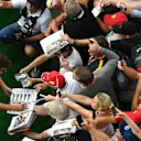 Fernando Alonso (ESP) McLaren signs autographs for the fans at Formula One World Championship, Rd9, Austrian Grand Prix, Qualifying, Spielberg, Austria, Saturday 8 July 2017. © Sutton Images
