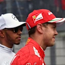 Lewis Hamilton (GBR) Mercedes AMG F1 and Sebastian Vettel (GER) Ferrari after Qualifying at Formula One World Championship, Rd9, Austrian Grand Prix, Qualifying, Spielberg, Austria, Saturday 8 July 2017. © Sutton Images