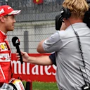 Davide Valsecchi (ITA) Sky Italia talks with Sebastian Vettel (GER) Ferrari after Qualifying at Formula One World Championship, Rd9, Austrian Grand Prix, Qualifying, Spielberg, Austria, Saturday 8 July 2017. © Sutton Images