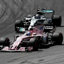 Sergio Perez (MEX) Force India VJM10 and Valtteri Bottas (FIN) Mercedes-Benz F1 W08 Hybrid at Formula One World Championship, Rd9, Austrian Grand Prix, Race, Spielberg, Austria, Sunday 9 July 2017. © Sutton Images