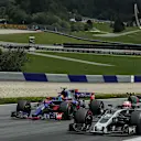 Kevin Magnussen (DEN) Haas VF-17 and Carlos Sainz (ESP) Scuderia Toro Rosso STR12 battle for position at Formula One World Championship, Rd9, Austrian Grand Prix, Race, Spielberg, Austria, Sunday 9 July 2017. © Sutton Images