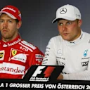 Sebastian Vettel (GER) Ferrari and Valtteri Bottas (FIN) Mercedes AMG F1 in the Press Conference at Formula One World Championship, Rd9, Austrian Grand Prix, Race, Spielberg, Austria, Sunday 9 July 2017. © Sutton Images