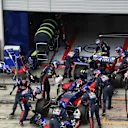 The car of race retiree Carlos Sainz (ESP) Scuderia Toro Rosso STR12 is pushed back into the garage by mechanics at Formula One World Championship, Rd9, Austrian Grand Prix, Race, Spielberg, Austria, Sunday 9 July 2017. © Sutton Images