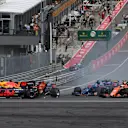 Max Verstappen (NED) Red Bull Racing RB13 collides at the start of the race at Formula One World Championship, Rd9, Austrian Grand Prix, Race, Spielberg, Austria, Sunday 9 July 2017. © Sutton Images