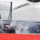 Fernando Alonso (ESP) McLaren MCL32 and Daniil Kvyat (RUS) Scuderia Toro Rosso STR12 collide at the start of the race at Formula One World Championship, Rd9, Austrian Grand Prix, Race, Spielberg, Austria, Sunday 9 July 2017. © Sutton Images