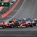 Sebastian Vettel (GER) Ferrari SF70-H and Kimi Raikkonen (FIN) Ferrari SF70-H at the start of the race at Formula One World Championship, Rd9, Austrian Grand Prix, Race, Spielberg, Austria, Sunday 9 July 2017. © Sutton Images