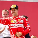 Sebastian Vettel (GER) Ferrari celebrates on the podium with the trophy at Formula One World Championship, Rd9, Austrian Grand Prix, Race, Spielberg, Austria, Sunday 9 July 2017. © Sutton Images