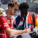 Sebastian Vettel (GER) Ferrari and Mr Moko (SEN) Chrome Hearts Jewellary at Formula One World Championship, Rd8, Azerbaijan Grand Prix, Qualifying, Baku City Circuit, Baku, Azerbaijan, Saturday 24 June 2017. © Sutton Images