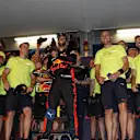Race winner Daniel Ricciardo (AUS) Red Bull Racing celebrates with the team and the trophy at Formula One World Championship, Rd8, Azerbaijan Grand Prix, Race, Baku City Circuit, Baku, Azerbaijan, Sunday 25 June 2017. © Sutton Images