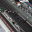 Daniil Kvyat (RUS) Scuderia Toro Rosso STR12 runs wide at the start of the race at Formula One World Championship, Rd8, Azerbaijan Grand Prix, Race, Baku City Circuit, Baku, Azerbaijan, Sunday 25 June 2017. © Sutton Images