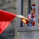 Marshal waves the red flag at Formula One World Championship, Rd8, Azerbaijan Grand Prix, Race, Baku City Circuit, Baku, Azerbaijan, Sunday 25 June 2017. © Sutton Images