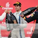 Valtteri Bottas (FIN) Mercedes AMG F1, Lance Stroll (CDN) Williams and Daniel Ricciardo (AUS) Red Bull Racing celebrate on the podium with the champagne at Formula One World Championship, Rd8, Azerbaijan Grand Prix, Race, Baku City Circuit, Baku, Azerbaijan, Sunday 25 June 2017. © Sutton Images