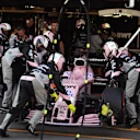 The car Sergio Perez (MEX) Force India VJM10 pits with a broken front wing and is pushed into the garage at Formula One World Championship, Rd8, Azerbaijan Grand Prix, Race, Baku City Circuit, Baku, Azerbaijan, Sunday 25 June 2017. © Sutton Images