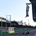 Race winner Daniel Ricciardo (AUS) Red Bull Racing RB13 takes the chequered flag at Formula One World Championship, Rd8, Azerbaijan Grand Prix, Race, Baku City Circuit, Baku, Azerbaijan, Sunday 25 June 2017. © Sutton Images