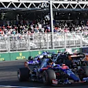 Daniil Kvyat (RUS) Scuderia Toro Rosso STR12 and Carlos Sainz jr (ESP) Scuderia Toro Rosso STR12 battle at Formula One World Championship, Rd8, Azerbaijan Grand Prix, Race, Baku City Circuit, Baku, Azerbaijan, Sunday 25 June 2017. © Sutton Images