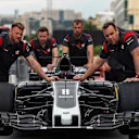 Haas F1 Mechanics with the car of Romain Grosjean (FRA) Haas VF-17 at Formula One World Championship, Rd8, Azerbaijan Grand Prix, Preparations, Baku City Circuit, Baku, Azerbaijan, Thursday 22 June 2017. © Sutton Images