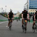 Daniel Ricciardo (AUS) Red Bull Racing rides a bicycle on track with the Red Bull Racing mechanics at Formula One World Championship, Rd8, Azerbaijan Grand Prix, Preparations, Baku City Circuit, Baku, Azerbaijan, Thursday 22 June 2017. © Sutton Images