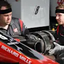 Haas F1 mechanics and Haas VF-17 front wheel hub at Formula One World Championship, Rd3, Bahrain Grand Prix Qualifying, Bahrain International Circuit, Sakhir, Bahrain, Saturday 15 April 2017. © Sutton Motorsport Images