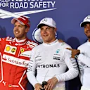 (L to R): Sebastian Vettel, Valtteri Bottas and Lewis Hamilton celebrate in parc ferme at F1 World Championship, Rd3, Bahrain Grand Prix Qualifying, Bahrain International Circuit, Sakhir, Bahrain, Saturday 15 April 2017. © Sutton Motorsport Images
