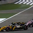 Jolyon Palmer (GBR) Renault Sport F1 Team RS17 and Sergio Perez (MEX) Force India VJM10 battle for position at Formula One World Championship, Rd3, Bahrain Grand Prix Race, Bahrain International Circuit, Sakhir, Bahrain, Sunday 16 April 2017. © Sutton Motorsport Images
