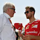 Sebastian Vettel (GER) Ferrari with Charlie Whiting (GBR) FIA Delegate at Formula One World Championship, Rd3, Bahrain Grand Prix Preparations, Bahrain International Circuit, Sakhir, Bahrain, Thursday 13 April 2017. © Sutton Motorsport Images