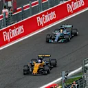 Jolyon Palmer (GBR) Renault Sport F1 Team RS17 and Lewis Hamilton (GBR) Mercedes-Benz F1 W08 Hybrid at Formula One World Championship, Rd12, Belgian Grand Prix, Practice, Spa Francorchamps, Belgium, Friday 25 August 2017. © Sutton Images
