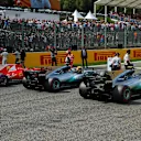 Lewis Hamilton (GBR) Mercedes AMG F1, Sebastian Vettel (GER) Ferrari and Valtteri Bottas (FIN) Mercedes AMG F1 celebrate in parc ferme at Formula One World Championship, Rd12, Belgian Grand Prix, Qualifying, Spa Francorchamps, Belgium, Saturday 26 August