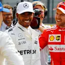 Pole sitter Lewis Hamilton (GBR) Mercedes AMG F1 celebrates in parc ferme with Sebastian Vettel (GER) Ferrari and Valtteri Bottas (FIN) Mercedes AMG F1 at Formula One World Championship, Rd12, Belgian Grand Prix, Qualifying, Spa Francorchamps, Belgium, Saturday 26 August 2017. © Sutton Images