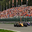 Jolyon Palmer (GBR) Renault Sport F1 Team RS17 and Carlos Sainz jr (ESP) Scuderia Toro Rosso STR12 battle at Formula One World Championship, Rd12, Belgian Grand Prix, Race, Spa Francorchamps, Belgium, Sunday 27 August 2017. © Sutton Images