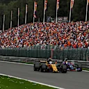 Jolyon Palmer (GBR) Renault Sport F1 Team RS17 and Carlos Sainz jr (ESP) Scuderia Toro Rosso STR12 battle for position at Formula One World Championship, Rd12, Belgian Grand Prix, Race, Spa Francorchamps, Belgium, Sunday 27 August 2017. © Sutton Images