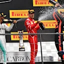 Race winner Lewis Hamilton (GBR) Mercedes AMG F1 celebrates on the podium with Sebastian Vettel (GER) Ferrari and Daniel Ricciardo (AUS) Red Bull Racing with the champagne at Formula One World Championship, Rd12, Belgian Grand Prix, Race, Spa Francorchamps, Belgium, Sunday 27 August 2017. © Sutton Images