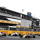 Sainz jr (ESP) Scuderia Toro Rosso STR12 and Palmer (GBR) Renault Sport F1 Team RS17 at the start of the race at Formula One World Championship, Rd12, Belgian Grand Prix, Race, Spa Francorchamps, Belgium, Sunday 27 August 2017. © Sutton Images