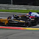 Jolyon Palmer (GBR) Renault Sport F1 Team RS17 and Daniil Kvyat (RUS) Scuderia Toro Rosso STR12 battle at Formula One World Championship, Rd12, Belgian Grand Prix, Race, Spa Francorchamps, Belgium, Sunday 27 August 2017. © Sutton Images