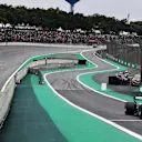 Pole sitter Valtteri Bottas (FIN) Mercedes-Benz F1 W08 Hybrid arrives in parc ferme whilst Sebastian Vettel (GER) Ferrari SF70-H and Kimi Raikkonen (FIN) Ferrari SF70-H park on track at Formula One World Championship, Rd19, Brazilian Grand Prix, Qualifying, Interlagos, Sao Paulo, Brazil, Saturday 11 November 2017. © Mark Sutton/Sutton Images