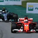Sebastian Vettel (GER) Ferrari SF70-H and Valtteri Bottas (FIN) Mercedes-Benz F1 W08 Hybrid at Formula One World Championship, Rd19, Brazilian Grand Prix, Race, Interlagos, Sao Paulo, Brazil, Sunday 12 November 2017. © Kym Illman/Sutton Images
