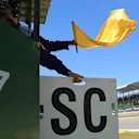 Marshal waves the Yellow flag at Formula One World Championship, Rd19, Brazilian Grand Prix, Race, Interlagos, Sao Paulo, Brazil, Sunday 12 November 2017. © Kym Illman/Sutton Images