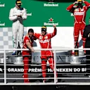 Race winner Sebastian Vettel (GER) Ferrari celebrates on the podium with G. Vietina (ITA) Ferrari at Formula One World Championship, Rd19, Brazilian Grand Prix, Race, Interlagos, Sao Paulo, Brazil, Sunday 12 November 2017. © Manuel Goria/Sutton Images