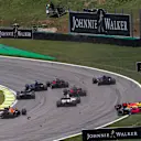 Daniel Ricciardo (AUS) Red Bull Racing RB13 and Stoffel Vandoorne (BEL) McLaren MCL32 collide at the start of the race at Formula One World Championship, Rd19, Brazilian Grand Prix, Race, Interlagos, Sao Paulo, Brazil, Sunday 12 November 2017. © Manuel Go