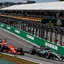 Alonso (ESP) McLaren MCL32 and Hamilton (GBR) Mercedes-Benz F1 W08 Hybrid battle for position at Formula One World Championship, Rd19, Brazilian Grand Prix, Race, Interlagos, Sao Paulo, Brazil, Sunday 12 November 2017. © Manuel Goria/Sutton Images