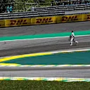 Stoffel Vandoorne (BEL) McLaren runs on track after colliding with Daniel Ricciardo (AUS) Red Bull Racing RB13 and crashing out at the start of the race at Formula One World Championship, Rd19, Brazilian Grand Prix, Race, Interlagos, Sao Paulo, Brazil, Su